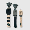 Cream and forest green knit driver headcover on golf bag